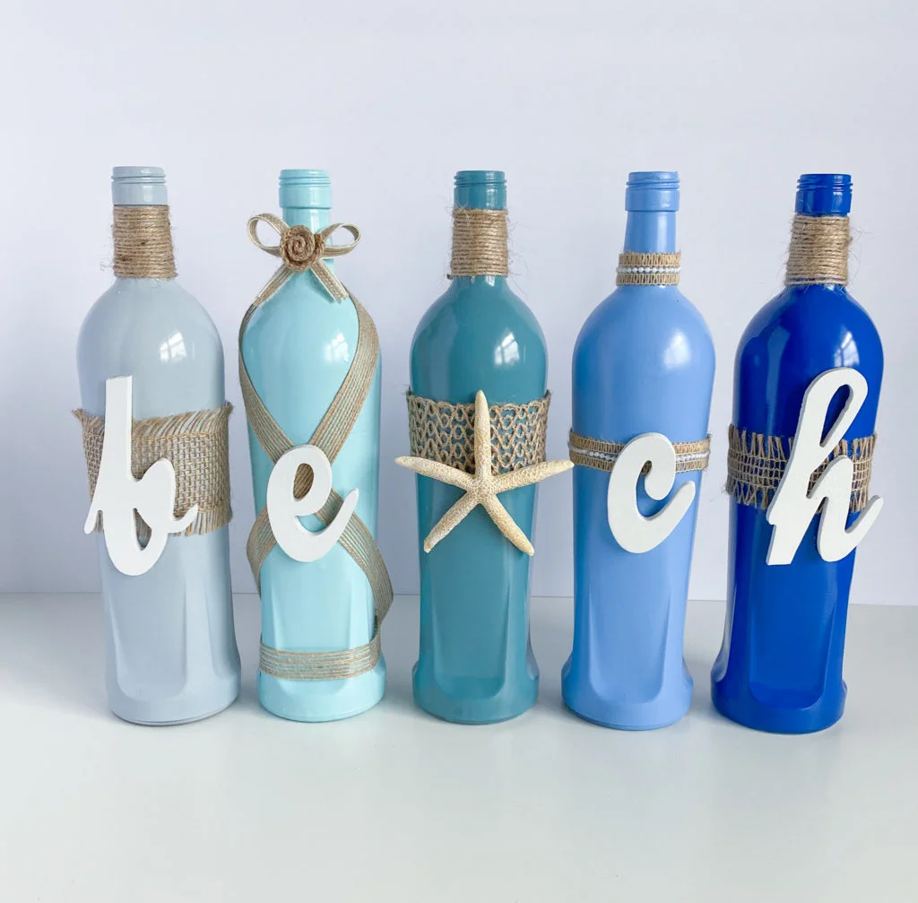 Bottles with letters glued on