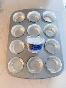Reynolds foil liners on top of muffin tin with 12 wells