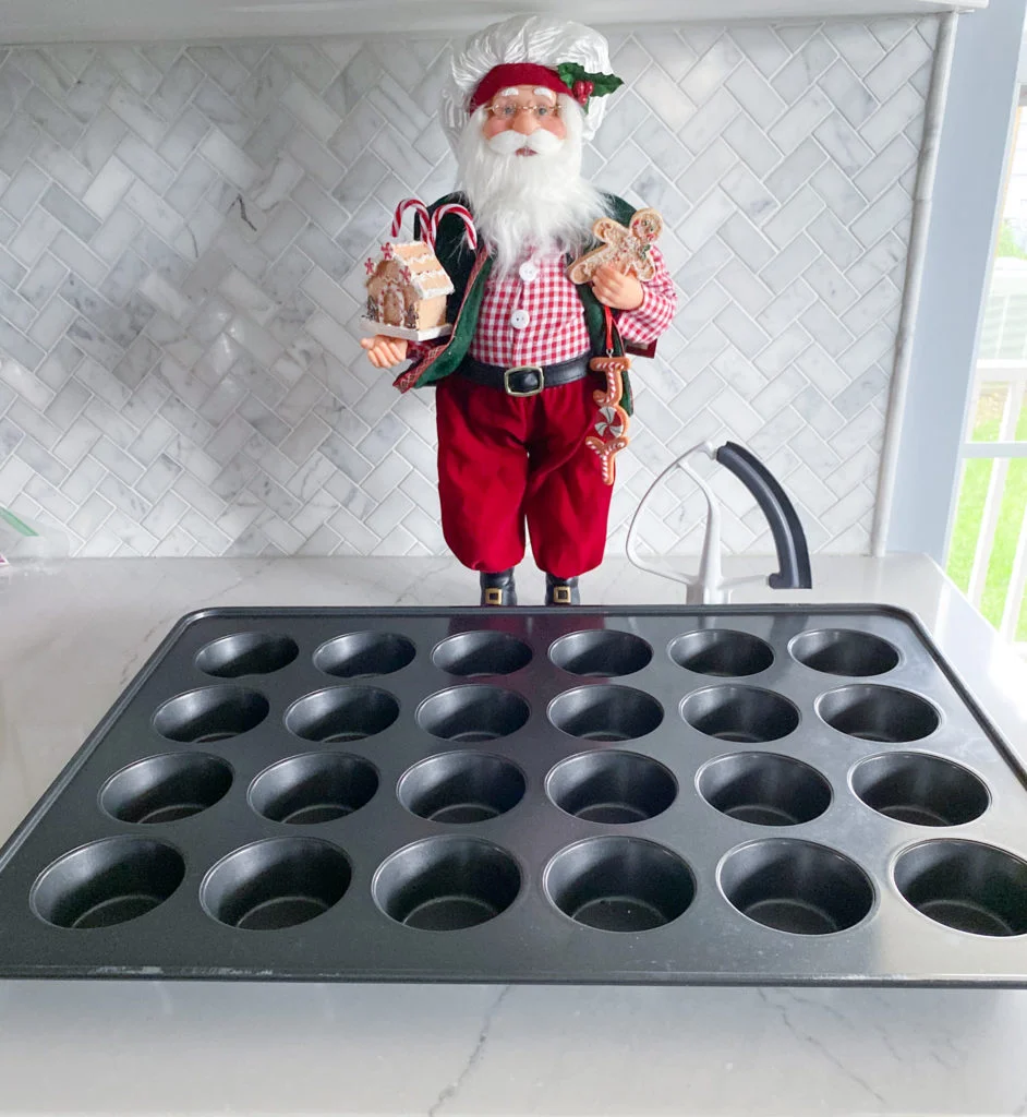 Cupcake pan with 24 standard sized wells & KitchenAid flex edge beater with baker Santa