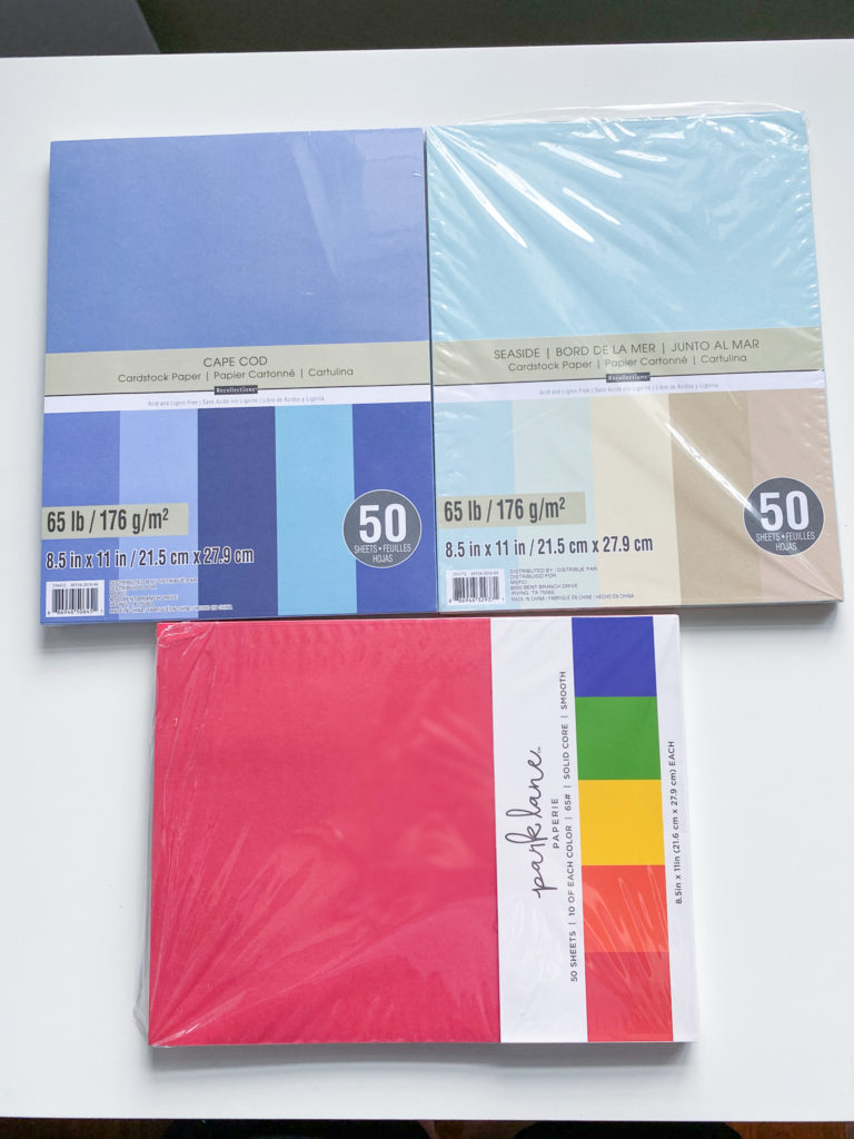 Packs of Recollections Cardstock paper in Cape Cod and Seaside, and Park Lane rainbow pack of cardstock