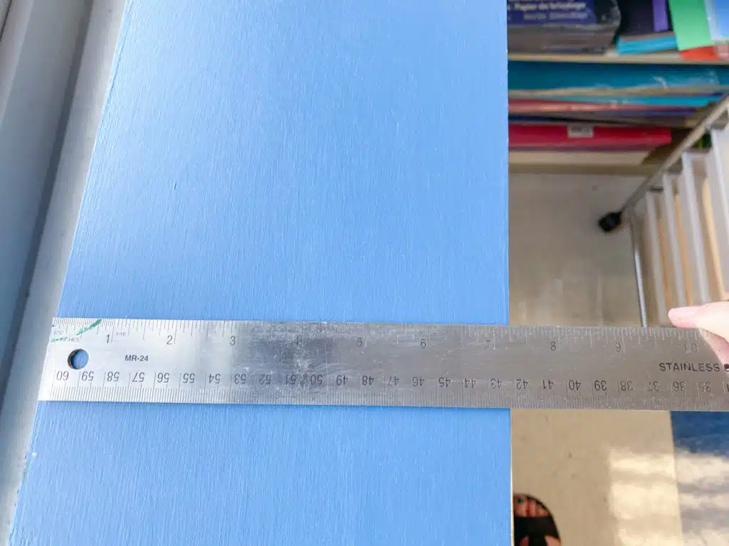 Depth of blue painted Ikea Moppe with ruler