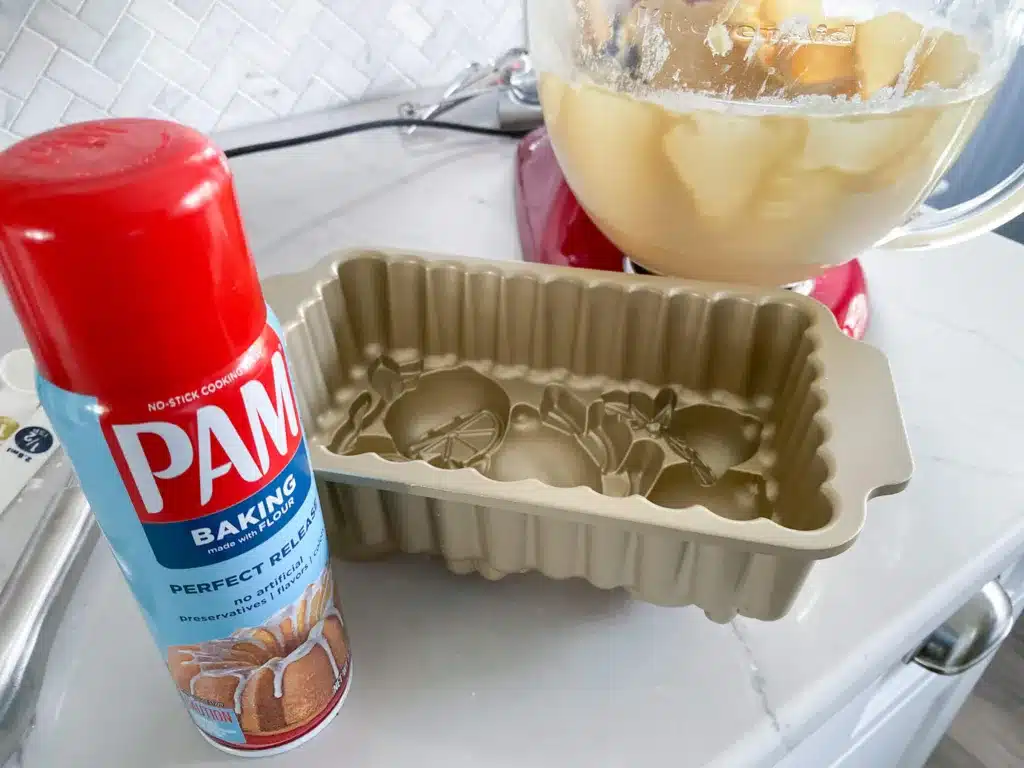 Pam baking spray, Nordicware citrus loaf pan and glass bowl of red stand mixer