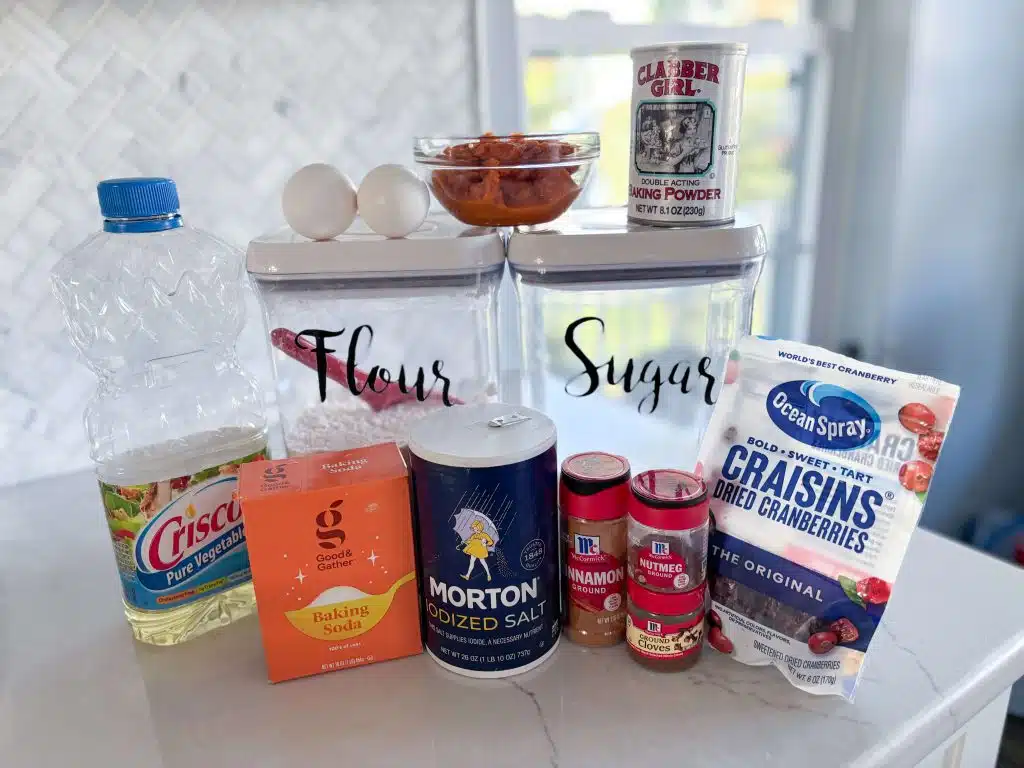 Ingredients: flour, sugar, baking soda, baking powder, salt cinnamon, nutmeg, ground cloves, vegetable oil, 2 eggs, pumpkin puree, and bag of Craisins